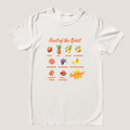 A white short-sleeve crewneck t-shirt with a colorful graphic print on the front. The graphic features various fruits (strawberries, pineapple, mango, banana, watermelon) paired with positive words like Love, Joy, Peace, Patience, Kindness, Goodness, Fruitfulness, Self-Control, and Calmness, along with a yellow sunburst that reads 'Galatians!'.