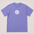 A light purple short-sleeve crewneck t-shirt with a white circular graphic on the chest containing the text 'remember the deeds of the Lord,' displayed flat against a light beige background.