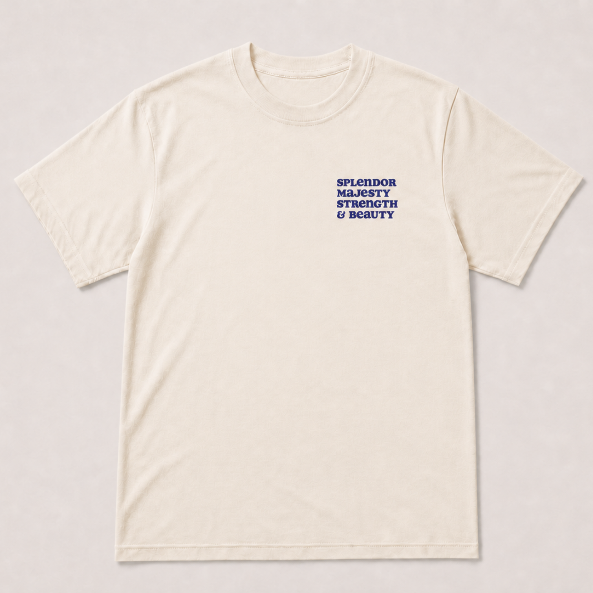 An off-white short-sleeve crewneck t-shirt with a small blue text graphic on the left chest reading 'SPLENDOR Majesty STRENGTH & BEAUTY', displayed flat against a light beige background.